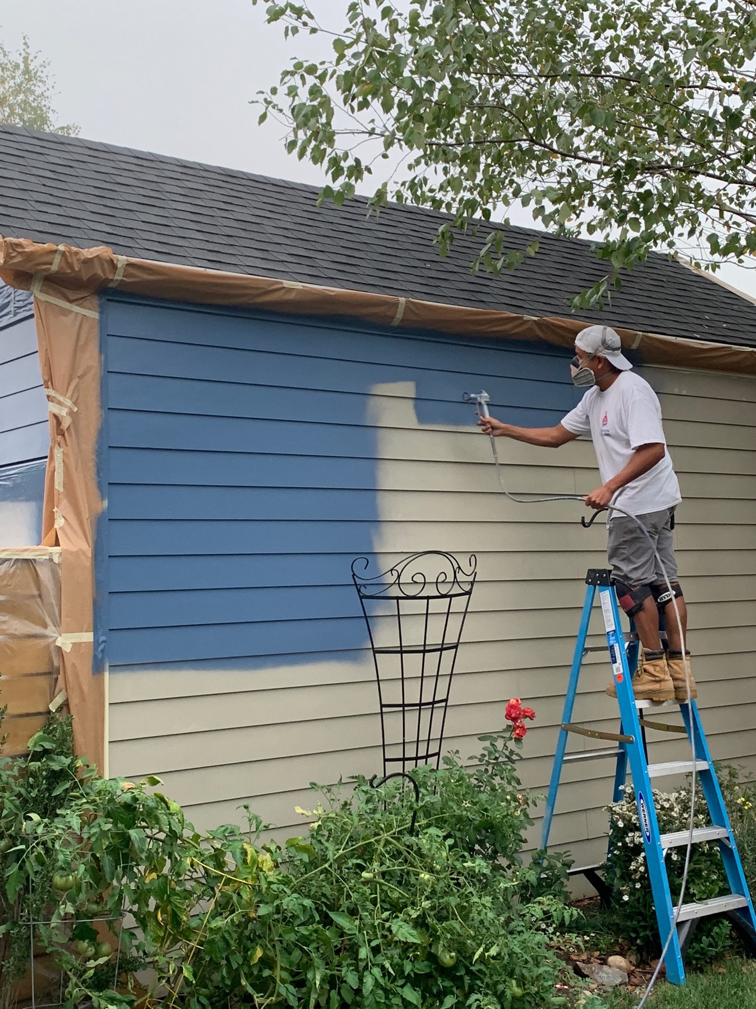 Exterior painting in progress on a Portland-area home